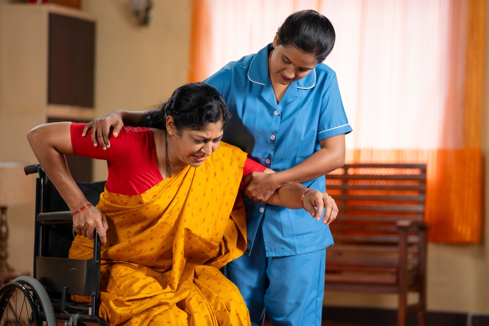 Side,View,Shot,Of,Happy,Indian,Nurse,With,Talking,With